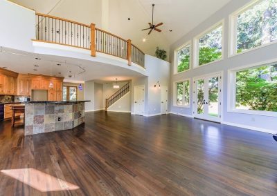 Freshly and bright interior painting with large windows and natural light in a modern Vancouver, WA home.